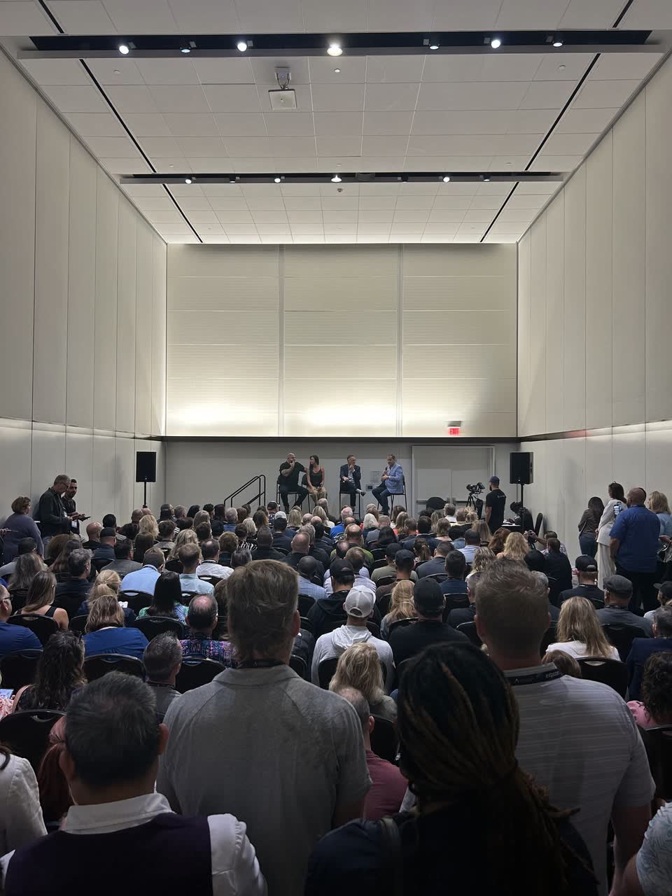 The Attracting Brokerages and Teams panel at eXpcon Miami 2024, with a full room